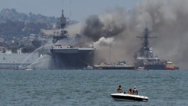 Fire crews battle San Diego navy ship fire, 18 sailors injured