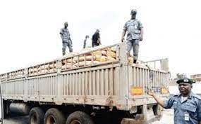 Customs kills 2 Suspected Smugglers over 12 trucks of foreign rice